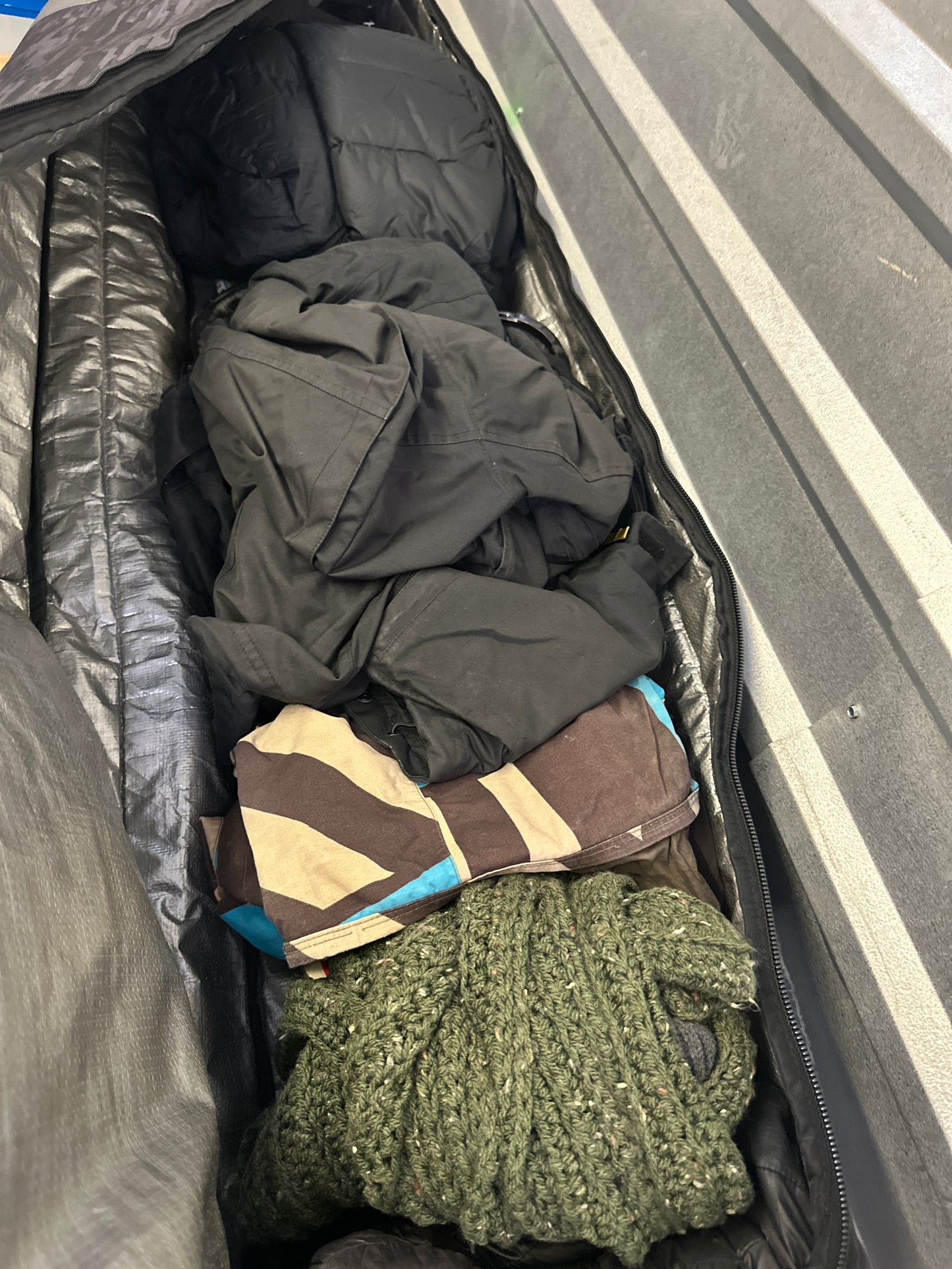 Snowboard with clothes and helmet and accessories